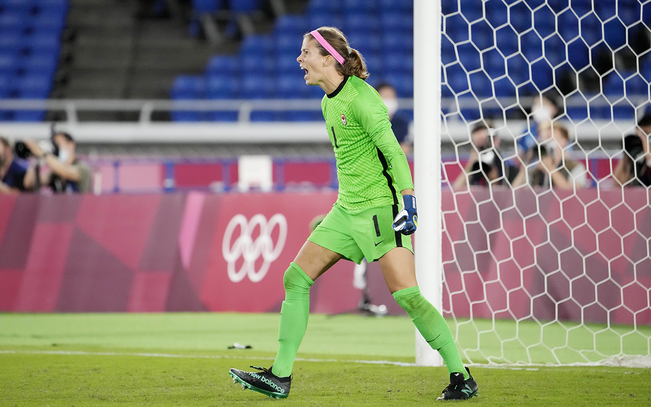 Canada's Stephanie Labbe celebrates after making a save against Sweden in the sixth round of the penalty shoot-out in the women's soccer final during the summer Tokyo Olympics in Yokohama, Japan on Friday, August 6, 2021. THE CANADIAN PRESS/Frank Gunn