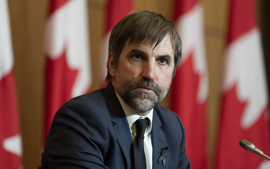 Minister of Environment and Climate Change Steven Guilbeault is seen during a news conference in Ottawa, Thursday, Sept. 15, 2022. Guilbeault says Canada's promised emissions cap on the oil and gas sector won't be finalized for another year.THE CANADIAN PRESS/Adrian Wyld