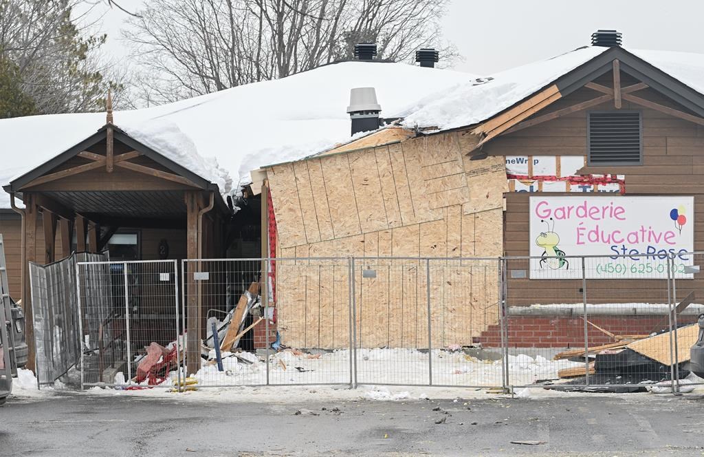 The scene outside a daycare centre in Laval, Que. is shown on Thursday, Feb.9, 2023, after a bus crashed into the building, killing two children. The preliminary hearing for a man accused of driving a city bus into a Laval, Que. daycare, killing two children, will begin March 25.THE CANADIAN PRESS/Graham Hughes