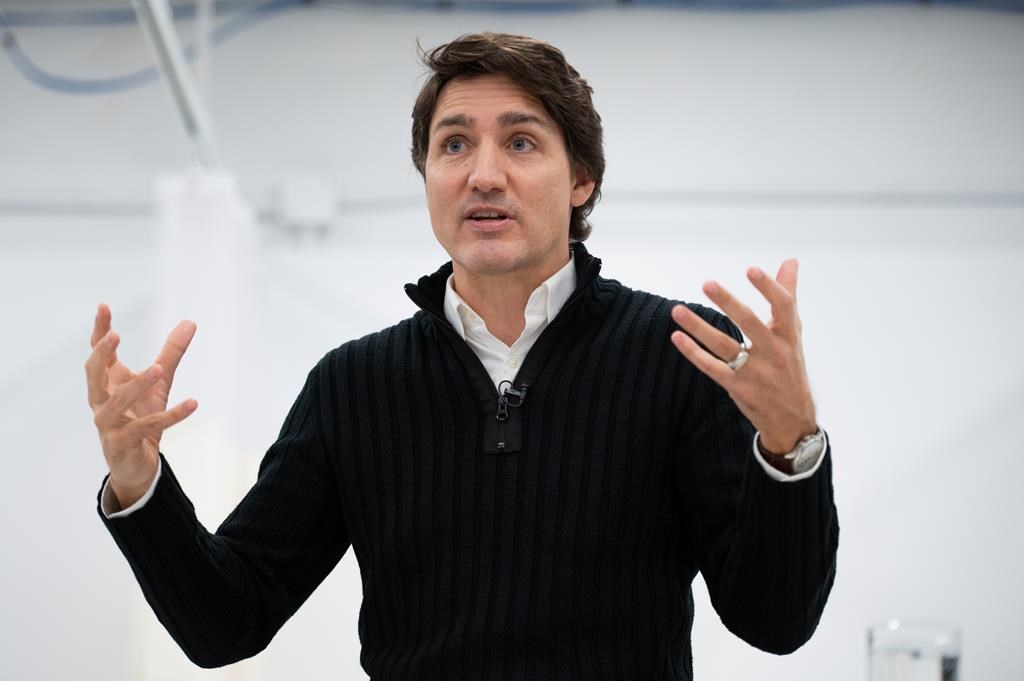 Prime Minister Justin Trudeau takes part in a discussion with nursing students from Algonquin College in Ottawa, Friday, Feb. 10, 2023. Prime Minister Justin Trudeau says he's pushing Canada's immigration system to soften its approach to processing visa applications, and put less focus on the risk of visitors overstaying their short-term visas. THE CANADIAN PRESS/Spencer Colby