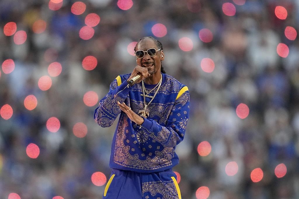 Snoop Dogg performs during halftime of the NFL Super Bowl 56 football game between the Los Angeles Rams and the Cincinnati Bengals in Inglewood, Calif., Sunday, Feb. 13, 2022. Another celebrity appears set to join in the bidding war for the NHL's Ottawa Senators. THE CANADIAN PRESS/AP-Marcio Jose Sanchez