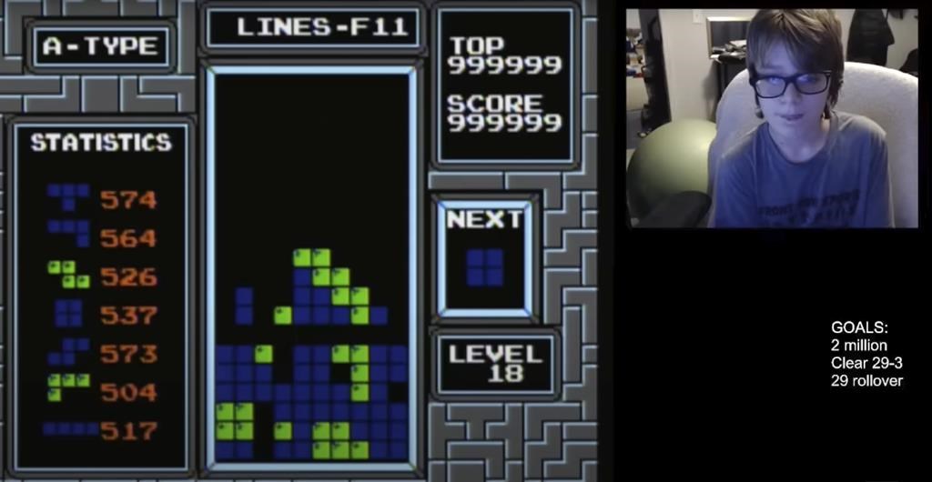 In this image taken from video, 13-year-old player named Willis Gibson plays a game of Tetris. Gibson, who in late December became the first player to officially “beat” the original Nintendo version of the game. By breaking it, of course. Technically, Gibson — aka “blue scuti” in the gaming world — made it to what gamers call a “kill screen,” a point where the Tetris code glitches, crashing the game. (Willis Gibson via AP)