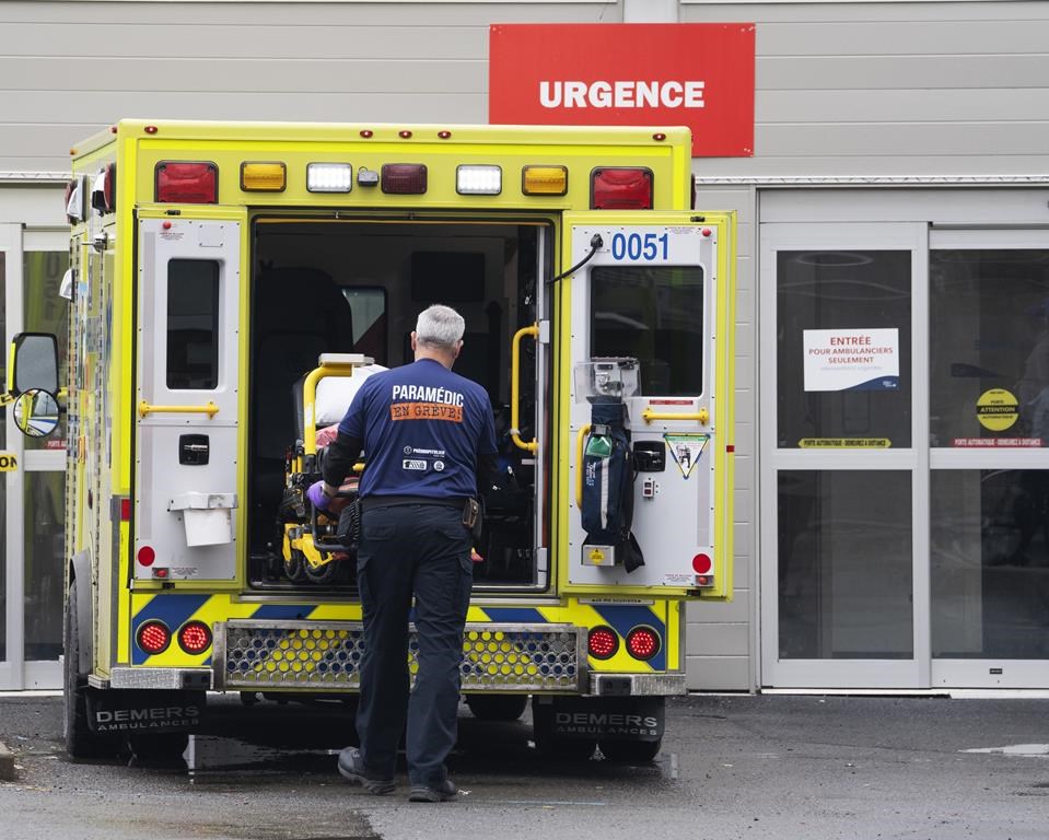 The Canadian Association of Emergency Physicians says it is "concerned" about comments made by Quebec Health Minister Christian Dubé in December suggesting that people visiting emergency departments unnecessarily is a significant reason for overcrowding. A paramedic loads his stretcher back into the ambulance after bringing a patient to the emergency room at a hospital in Montreal, Thursday, April 14, 2022. THE CANADIAN PRESS/Ryan Remiorz