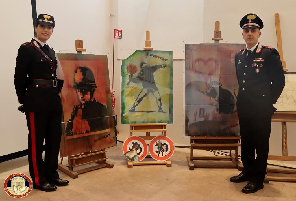 Fake Banksy artworks that were sized by police are show in Rome in this handout image provided by the Italian Culture Ministry on Tuesday, Oct. 15, 2024. (AP Photo/Italian Culture Ministry, HOGP)