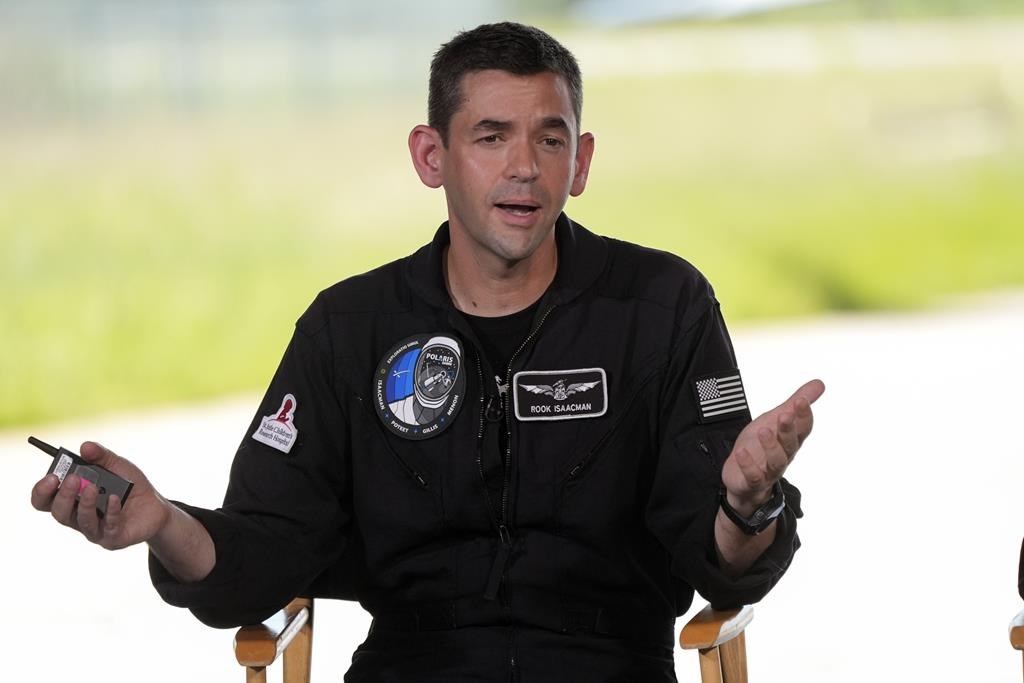 FILE - Commander Jared Isaacman speaks at a news conference after arriving at the Kennedy Space Center for an upcoming private human spaceflight mission in Cape Canaveral, Fla., Monday, Aug. 19, 2024. (AP Photo/John Raoux, File)