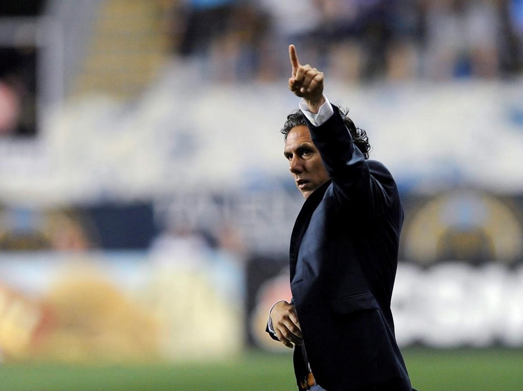 Mauro Biello signals during the second half of Montreal Impact's MLS soccer match against the Philadelphia Union on Saturday, Aug. 12, 2017, in Chester, Pa. THE CANADIAN PRESS/AP/Michael Perez