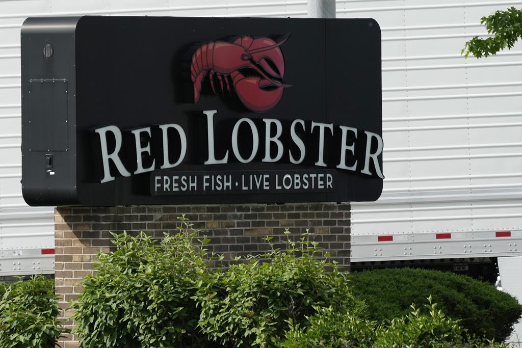 Red Lobster restaurant signage is seen in Schaumburg, Ill., Monday, May 20, 2024. A lawyer for Red Lobster Canada, Inc. says he will ask an Ontario court today to recognize and enforce the chain’s U.S. bankruptcy protection proceedings, a process which documents show could include selling Canadian assets. THE CANADIAN PRESS/AP/Nam Y. Huh