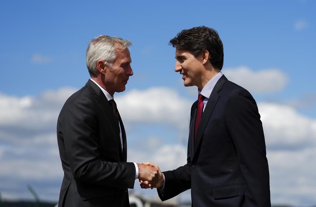 Prime Minister Justin Trudeau is greeted by Canadian ambassador to Switzerland Patrick Wittmann as he arrives in Zurich, Switzerland on Saturday, June 15, 2024. Trudeau will be attending the Ukraine peace summit. THE CANADIAN PRESS/Sean Kilpatrick
