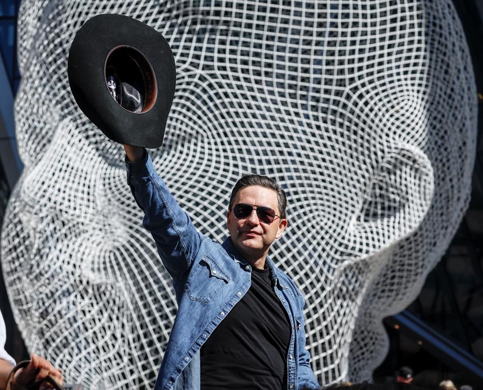 Conservative Leader Pierre Poilievre is expected to make his first in-person address at the Assembly of First Nations today. Poilievre waves to the crowds during the Calgary Stampede parade in Calgary, Alta., Friday, July 5, 2024. THE CANADIAN PRESS/Jeff McIntosh