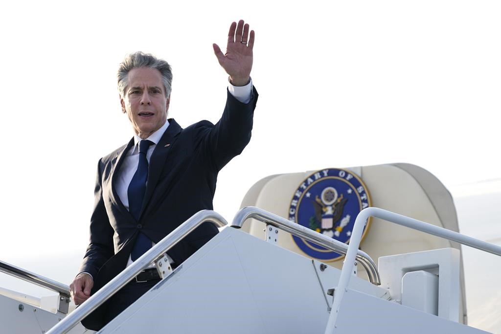 FILE - Secretary of State Antony Blinken waves as he boards his plane to depart Yokota Air Base in Fussa, on the outskirts of Tokyo, July 29, 2024. (AP Photo/Shuji Kajiyama, Pool, File)