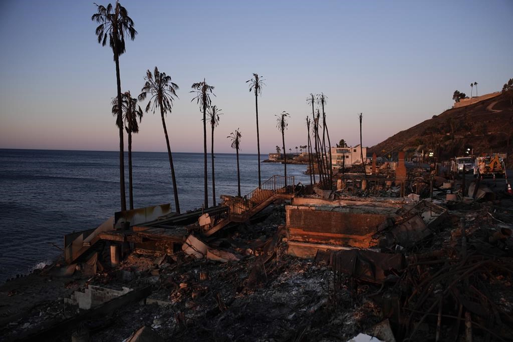 Homes along the Pacific coast are burned to the ground in the aftermath of the Palisades Fire Monday, Jan. 13, 2025 in Malibu, Calif. (AP Photo/John Locher)