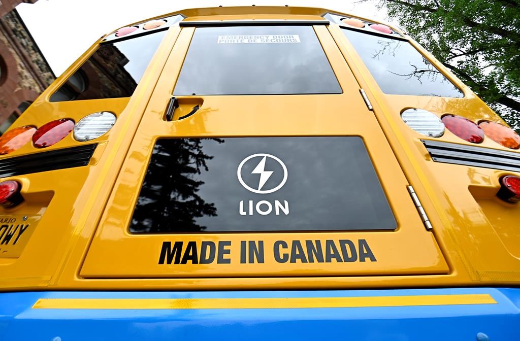 A LionC fully electric school bus is seen at an event promoting the Greening Government Fund, which provides funding to federal departments and agencies to reduce greenhouse gas emissions in their operations, in Ottawa, on Tuesday, June 27, 2023. THE CANADIAN PRESS/Justin Tang